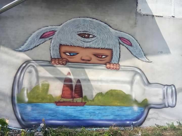 Nong Mardi on a wall in the Talad Tai hamlet, Krasom Subdistrict Municipality