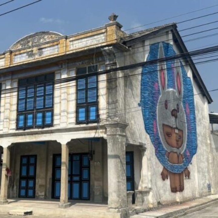 Nong Mardi on a wall in the Talad Tai hamlet, Krasom Subdistrict Municipality